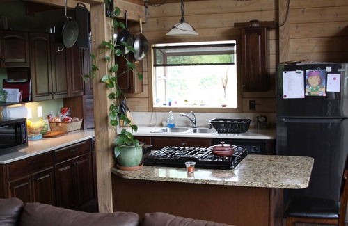 Oak Harbor Ski Chalet | Chalet overlooking quiet bay, surrounded by Deception Pass state park