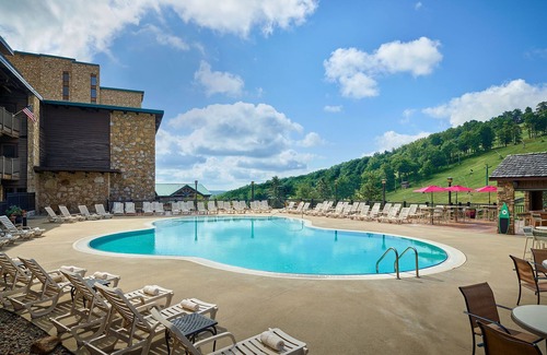 Seven Springs Apartment | Champion Hotel | King Suite + Separate Living Area
