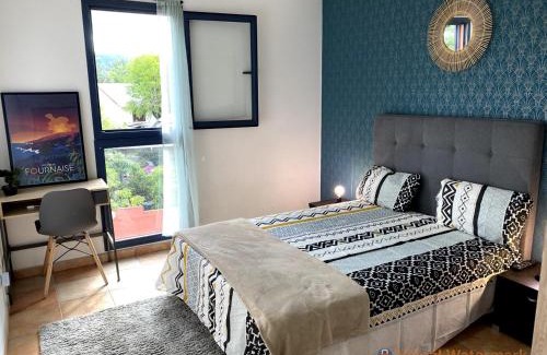 Sainte-Clotilde Apartment | Charmant T2 - Moufia Sainte-Clotilde vue Mer & Montagne