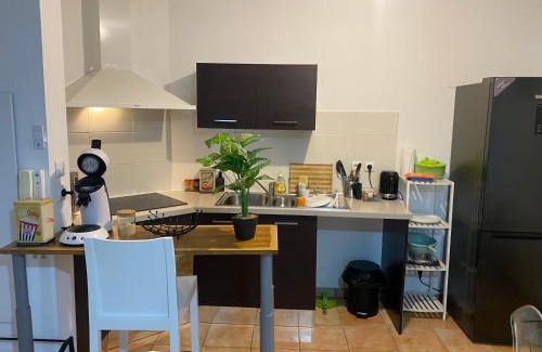 Sainte-Clotilde Apartment | Charmant T2 - Moufia Sainte-Clotilde vue Mer & Montagne