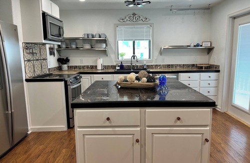 Port Bolivar House | Charming 2-bedroom house with boat slip, WiFi, AC in welcoming Bolivar Peninsula