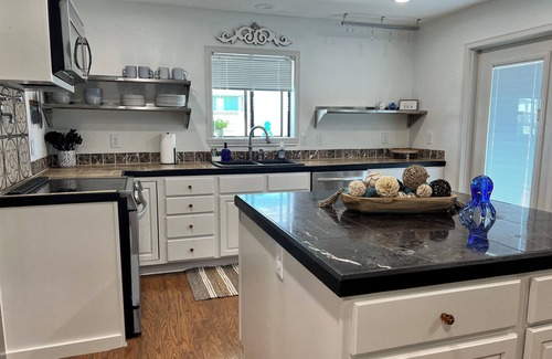 Port Bolivar House | Charming 2-bedroom house with boat slip, WiFi, AC in welcoming Bolivar Peninsula