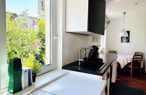 Altrip Apartment | Charming apartment with air conditioning, WiFi, smart TV surrounded by greenery
