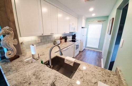 Butler Beach Condo | Charming Beach Condo: 2 Bedrooms, Pools & Tennis Courts