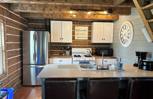Canon City Cabin | Charming Creekside Cabin next to 4 Mile Creek with mountain views. Dog friendly!