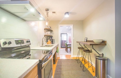 Beach Institute Cottage | Charming Gordon Street Retreat with Courtyard & Parking by Lucky Savannah