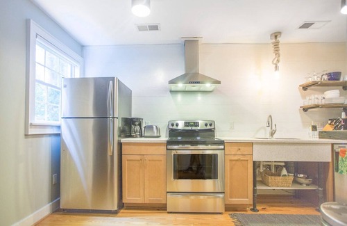 Beach Institute Cottage | Charming Gordon Street Retreat with Courtyard & Parking by Lucky Savannah