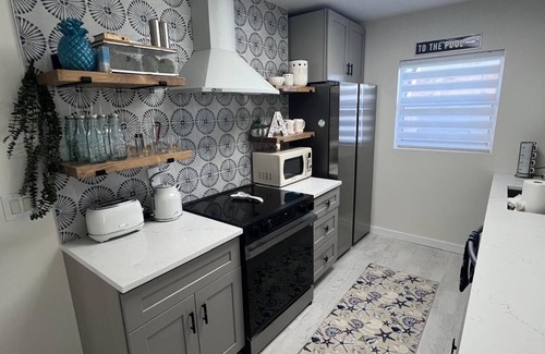 Holmes Beach Cottage | Charming Ground Level Resort Style 3 units Condo of a TRIPLEX- unit A