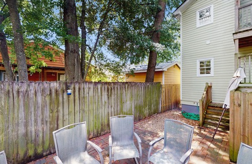 Beach Institute Apartment | Charming home with shared patio, backyard dining & cozy reading nook