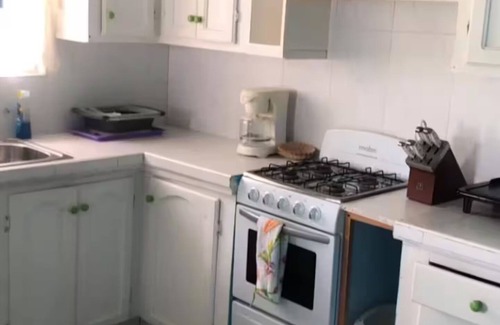 Ruby House | Charming house in terrific Long Bay with AC, WiFi