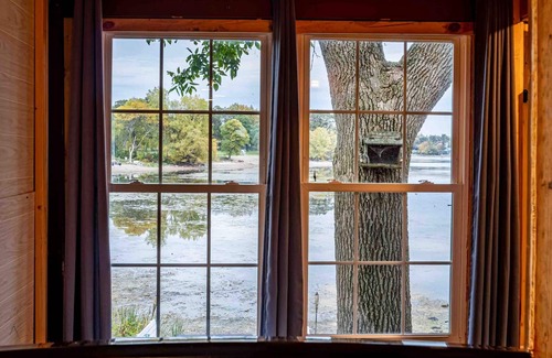 Chaumont Cottage | “Charming + Nostalgic Lakefront Cottage with Dock”