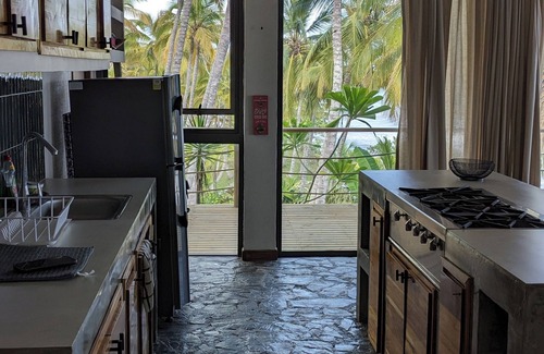 Palomino Villa | Charming oceanfront cabin with stunning views, private terrace, and beach access