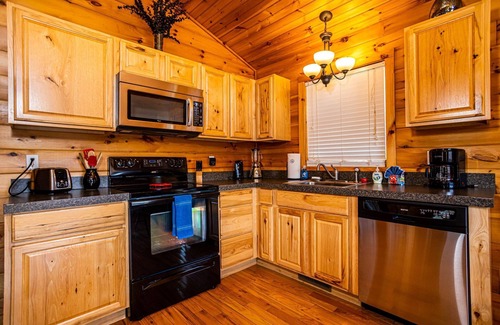 Barren Springs House | Charming riverside with stunning views, cozy interiors, full amenities, and spacious decks.