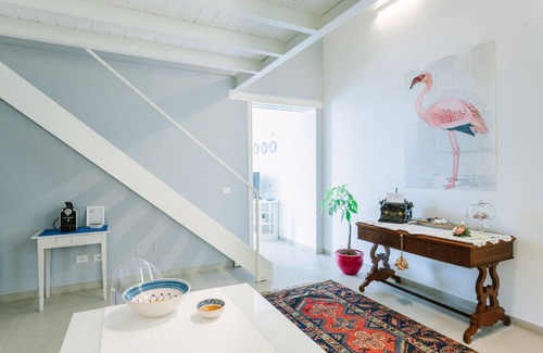 Ortigia Apartment | Charming Sea-View Hideaway in Ortigia. WiFi, Lift and 2 Bikes. Pet-friendly.