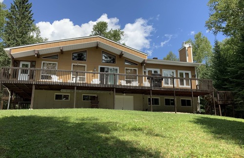 Riviere-Rouge Ski Chalet | Charming Waterfront Cottage 35 minutes from Mont-Tremblant