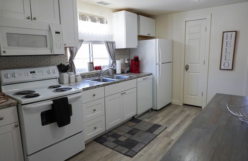 Berkley House | Check this house out! It has a Hot Tub, Gas Fire Pit and Corn Hole!