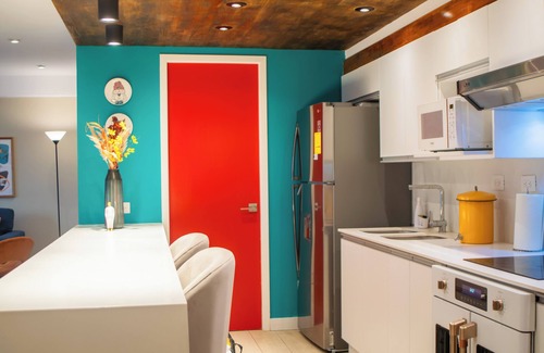 Zona 4 Apartment | Chic and Modern 9th floor 2B/2B Apt in Downtown