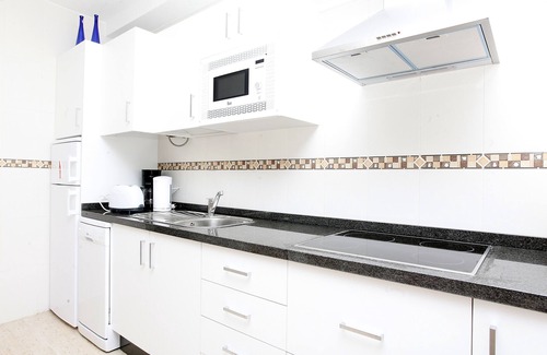 El Cotillo Apartment | Chic apartment with sea views on a sandy beach, large roof terrace and WiFi