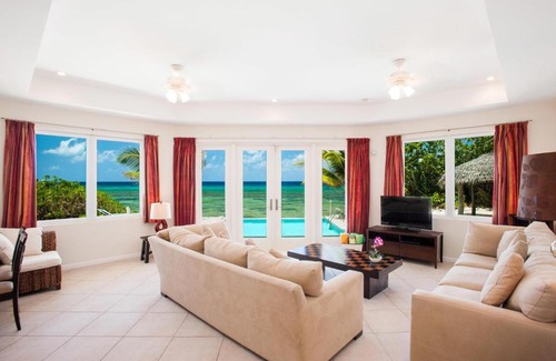Old Man Bay House | Christmas Palms by Grand Cayman Villas & Condos