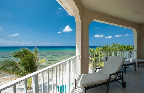 Old Man Bay House | Christmas Palms by Grand Cayman Villas & Condos