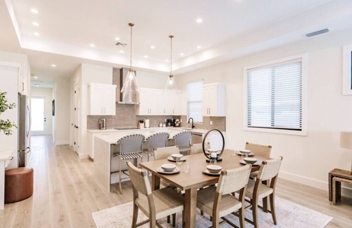Naples Park House | Coastal Elegance Dual Master Bedroom Luxury Beach Home Heated Pool Pet Friendly