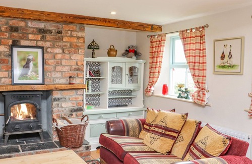 Kilmore Cottage | COB COTTAGE, pet friendly, with a garden in Kilmore, County Wexford