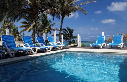 North Side House | Coco Kai Beach Front Villa with Heated Pool and Private Dock