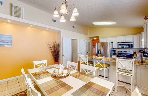 Panama City Beach Cottage | Colorful home near the beach with 2 pools, bikes, beach gear, W/D, & AC