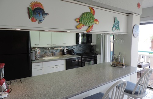 Estate Golden Rock Condo | Come Sail Away and relax at our beautifully remodeled 2Br/2Ba condo on the beach