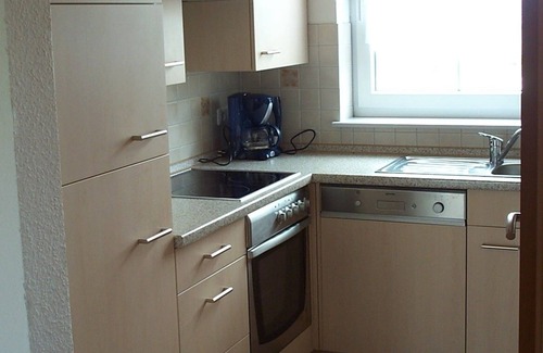 Krummhoern House | Comfortable four-star Friesenhaus with jetty and terrace on the canals