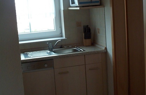 Krummhoern House | Comfortable four-star Friesenhaus with jetty and terrace on the canals