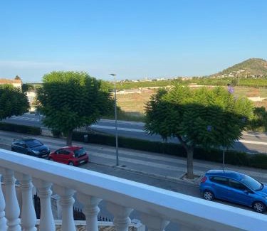Beniarjo House | Comfortable guest room with balcony
