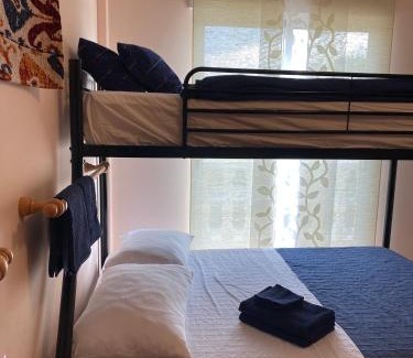 Beniarjo House | Comfortable guest room with balcony
