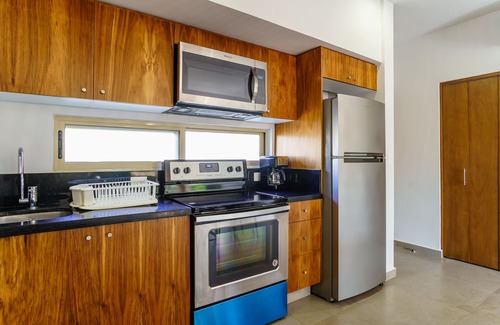 Zama Apartment | Condo Complex with an Alluring Pool & Tropical Vibes by Stella Rentals