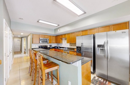 Crescent Beach Condo | Condo with 2 primary suites, balcony, beach views, grills, & pool-near beach