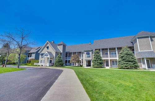 Boyne City Condo | Condo with Lake Charlevoix Views | Private Beach Access | Gas Log Fireplace