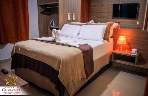 Praia do Morro Apartment | CONFORTO IMBATIVEL - 25 metros do MAR - 2 Quartos com AR CONDICIONADOS SPLIT, Air Fryer, WI-FI, Disney Plus, Star Plus, HBO Max, Guarda Sol, Cadeiras de Praia e Caixa Térmica - 8 pessoas com Muito Conforto - Melhor Localização!