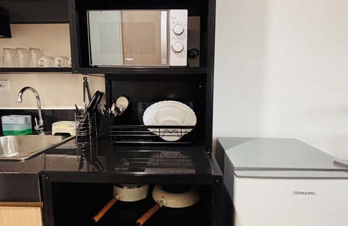 Iloilo Condo | Contemporary City Suite with Relaxing Charm