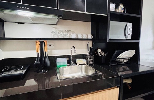 Iloilo Condo | Contemporary City Suite with Relaxing Charm