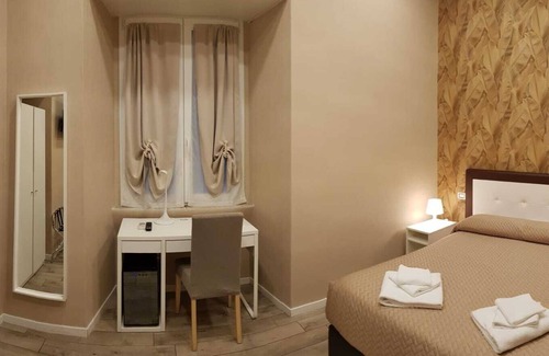 Quartiere XI Portuense Bed & Breakfast | Convenient Booking B&B, situated in Rome, less than1 km from Roma Trastevere.