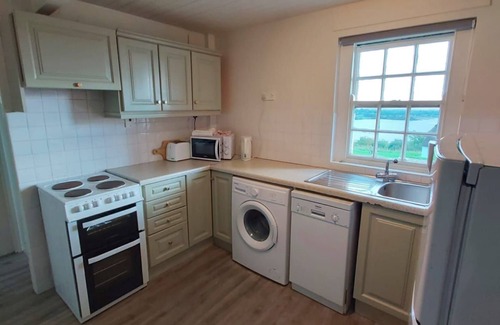 Killinaboy Cottage | Corofin Lake Cottage No 2 - a two story that sleeps 8 guests in 4 bedrooms