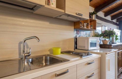 Vito d'Asio Apartment | Cosy apartment for 2 people with WIFI, pool, A/C, TV, patio and pets allowed