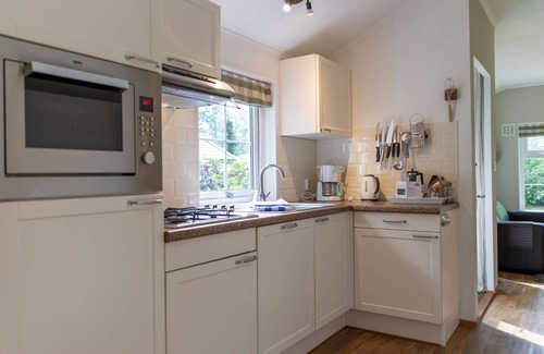 Municipality of Dalfsen House | Cosy apartment in villa for 4 guests with WIFI, pool, TV and terrace