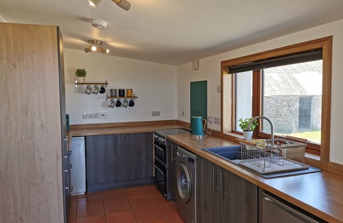 Canisbay Cottage | Cosy Highland retreat with countryside and sea views.