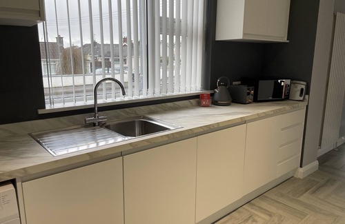 Lisnagunogue House | Cosy split level Bungalow in Ballymena, County Antrim, Northern Ireland.