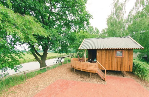 Zuna Cottage | Cottage with terrace on the river De Regge