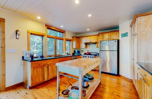 Ludlow Cabin | Countryside, lakefront cabin with kayaks, stone fireplace, balcony, & fast WiFi