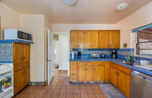 West University House | Cozy 2BR Home Near UNR with Large Deck & Parking
