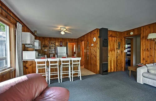 Burt Lake House | Cozy Alanson Cottage - Steps to Dock on Burt Lake!