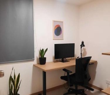 Villa Nueva Apartment | Cozy Apartment in Historic Prado with adjustable desk and 4K Monitor